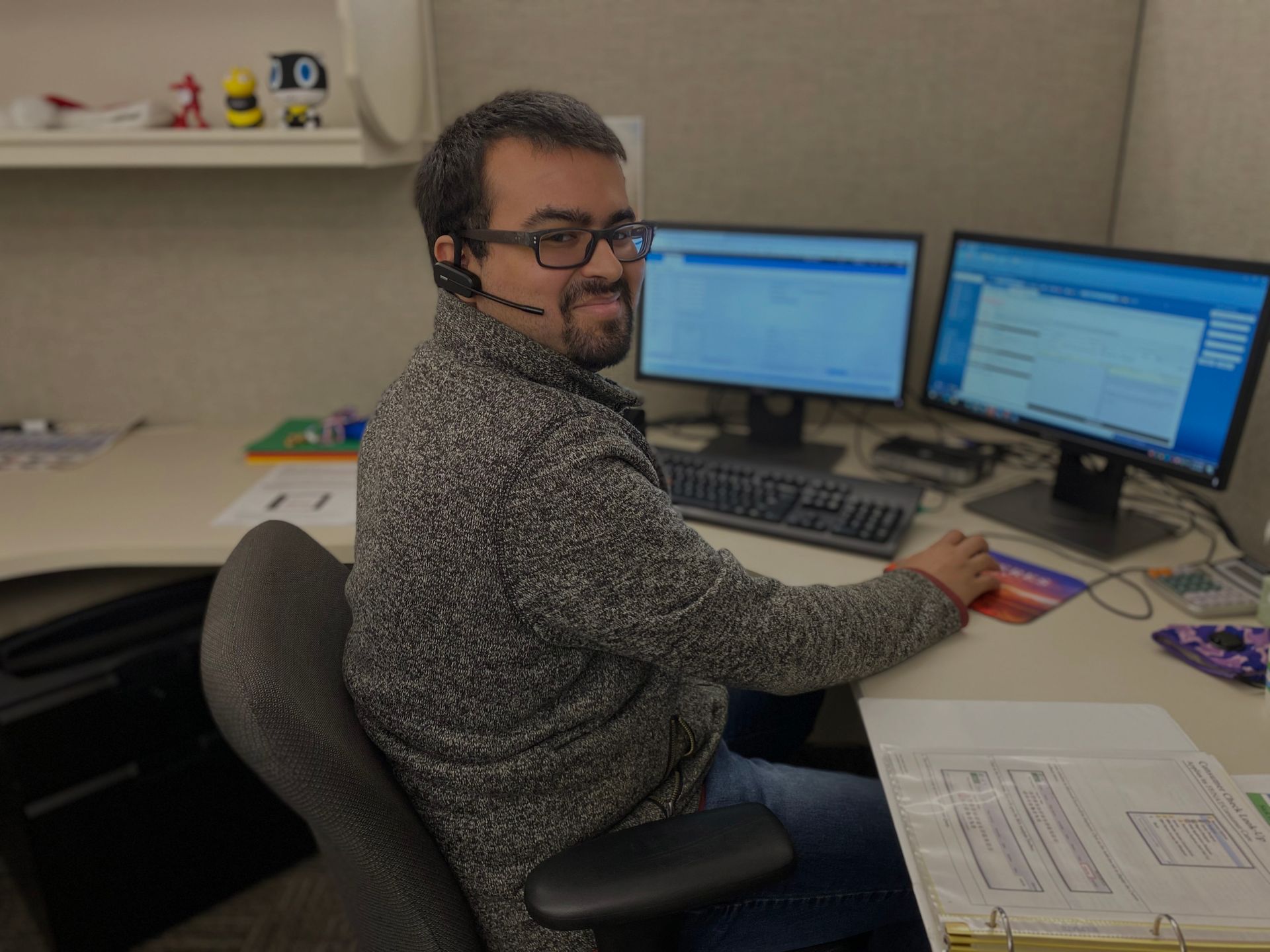 Person from Consumer Care working at desk
